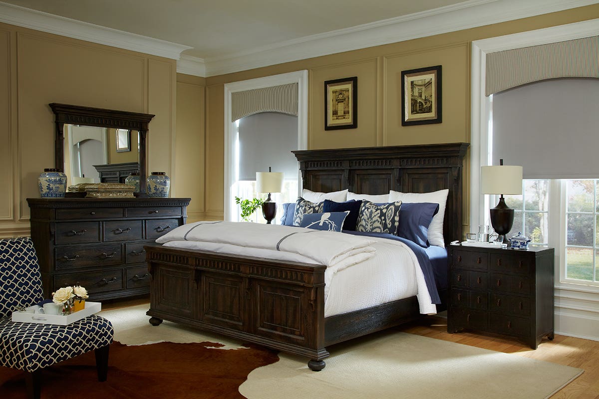 Bedroom with Partially Closed Blackout Roller Shades