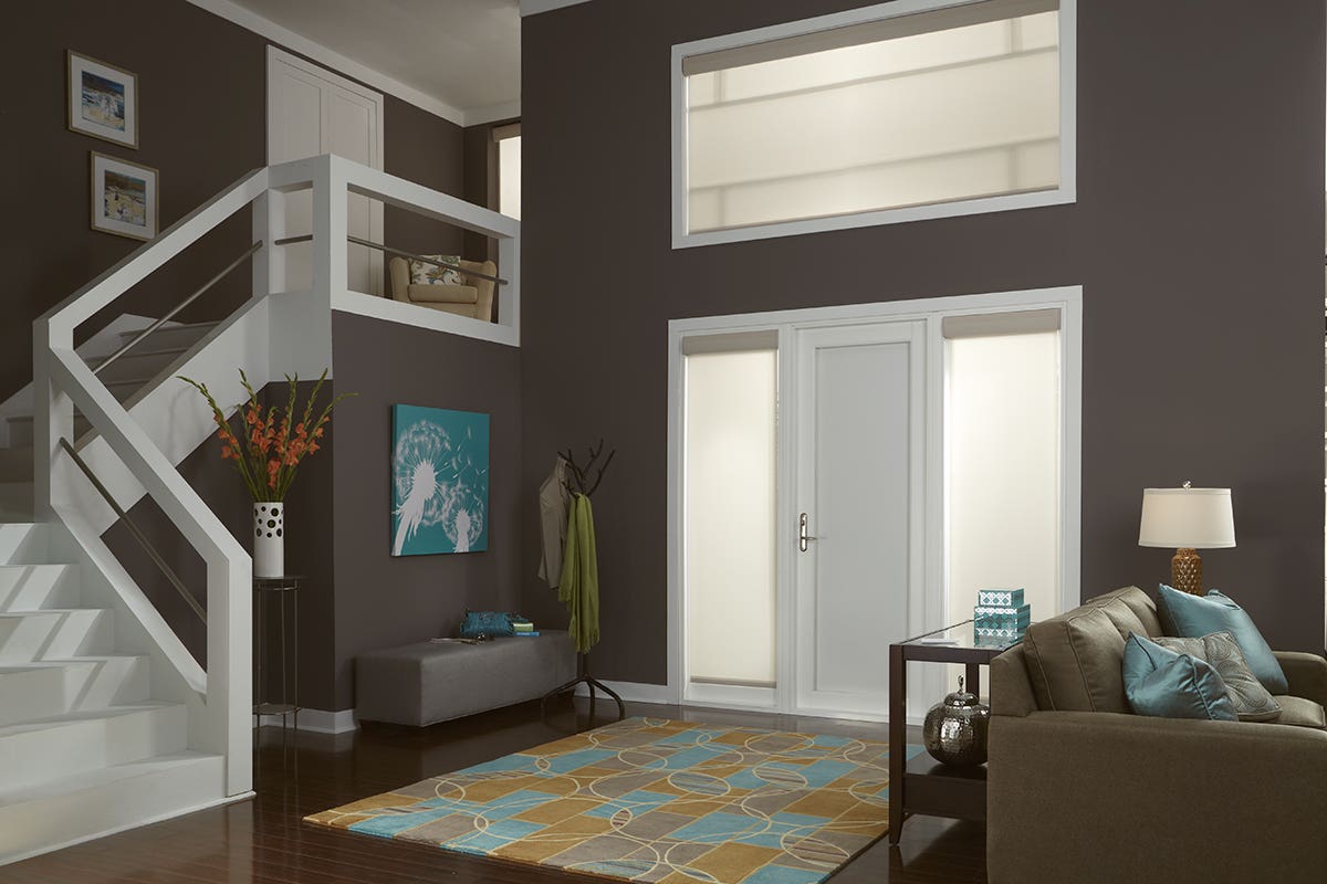 Empty Foyer with Fully Closed Translucent Roller Shades on Windows