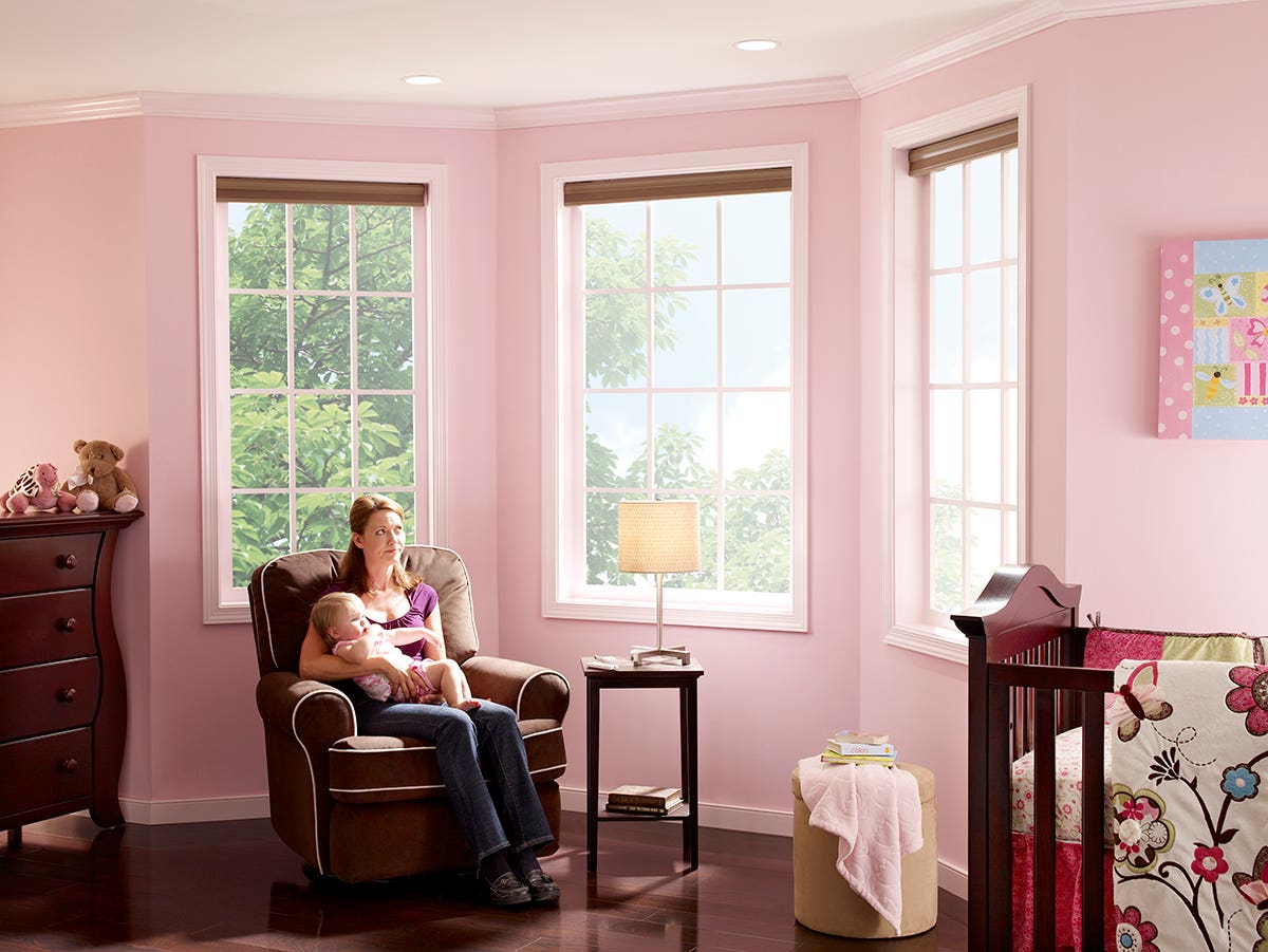 Mother and Baby in Nursery with Open Room-Darkening Honeycomb Shades