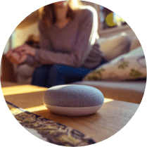 Smart speaker sitting on coffee table