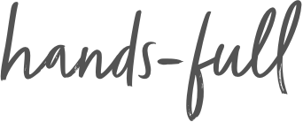 Hands-full written in cursive